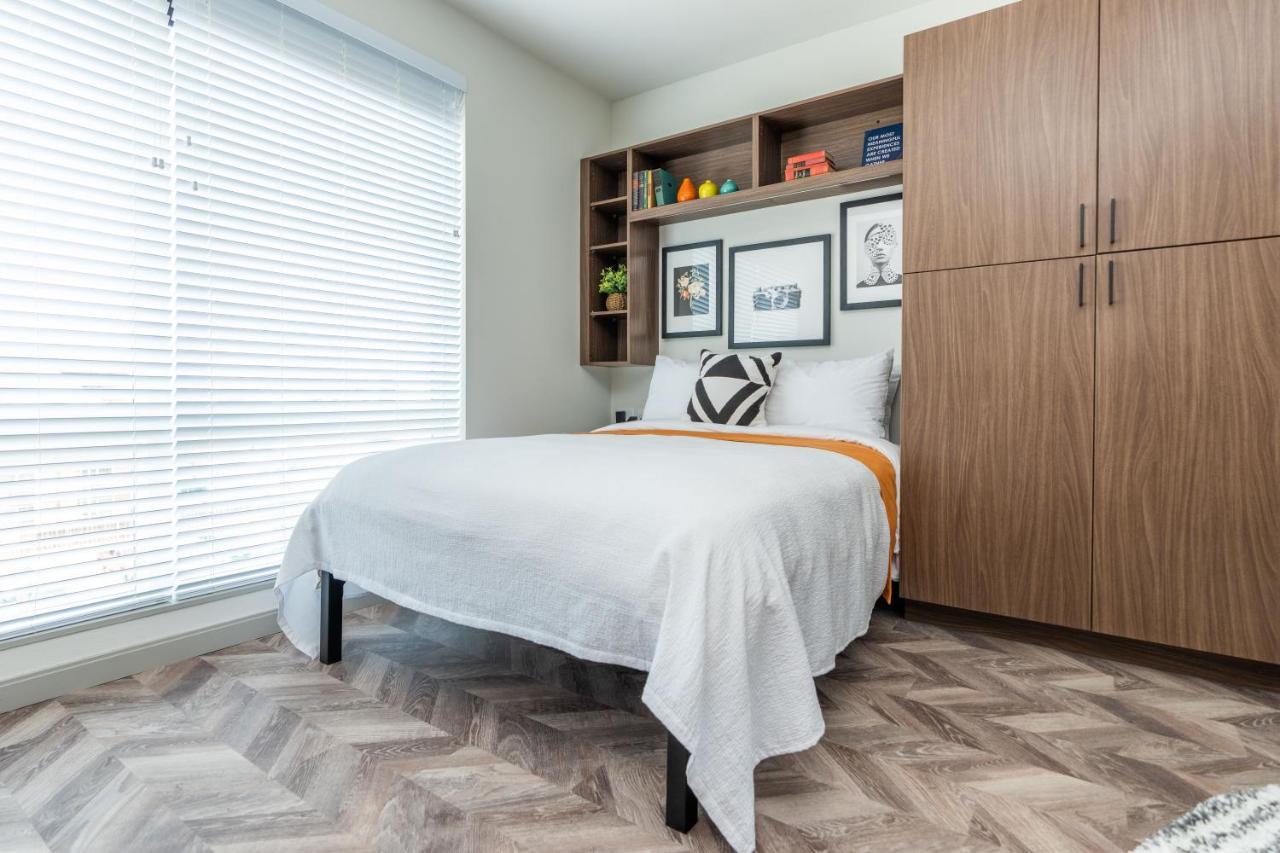 Yugo Guest Suites Urbana Exterior photo