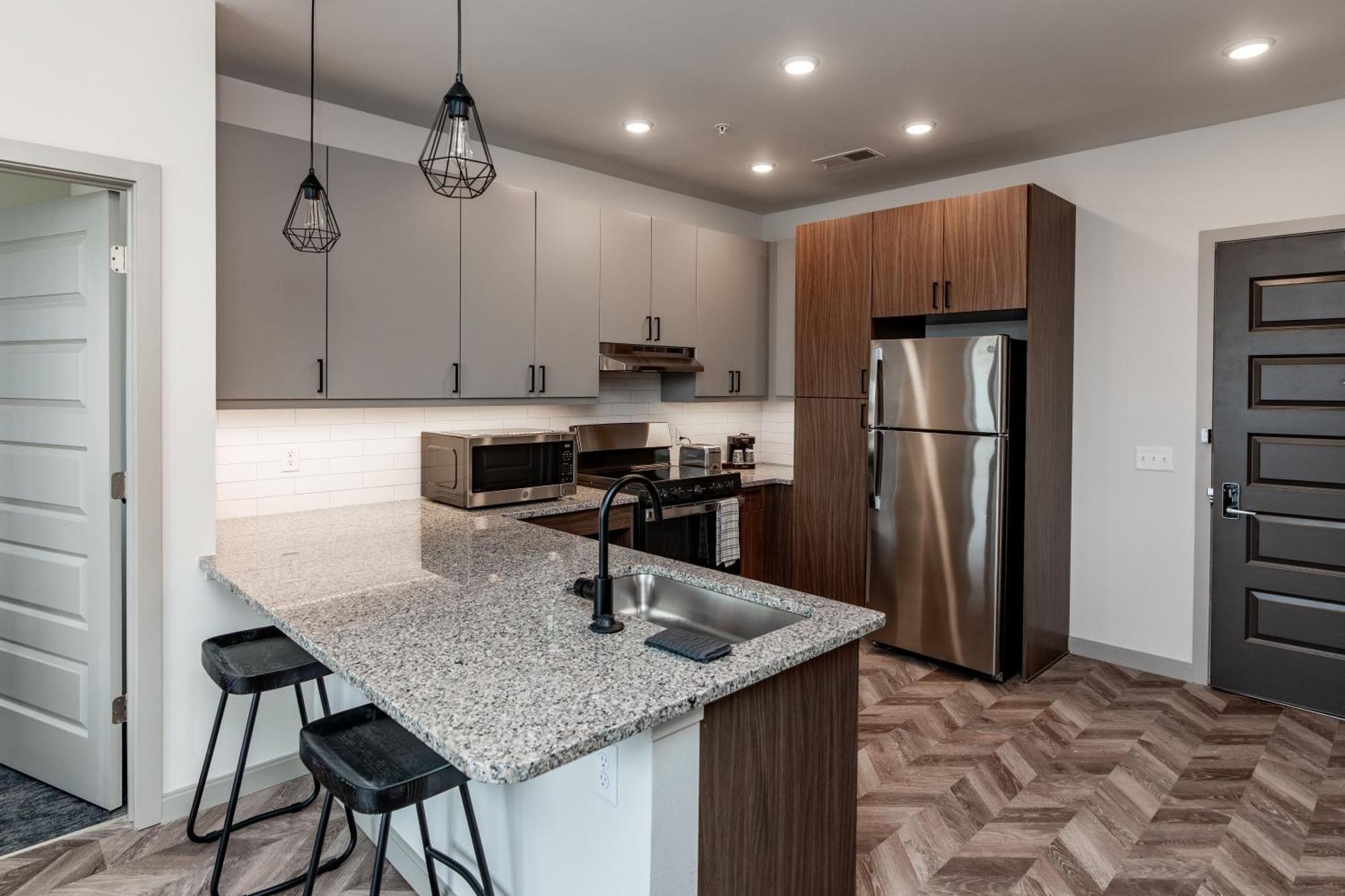 Yugo Guest Suites Urbana Exterior photo